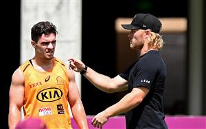BRISBANE, AUSTRALIA - DECEMBER 01: Brisbane Lions AFL player Daniel Rich is seen giving tips to Brodie Croft during a Brisbane Broncos NRL training session at the Clive Berghofer Centre on December 01, 2020 in Brisbane, Australia. (Photo by Bradley Kanaris/Getty Images)