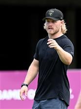 BRISBANE, AUSTRALIA - DECEMBER 01: Brisbane Lions AFL player Daniel Rich is seen giving tips to the players during a Brisbane Broncos NRL training session at the Clive Berghofer Centre on December 01, 2020 in Brisbane, Australia. (Photo by Bradley Kanaris/Getty Images)