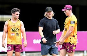 BRISBANE, AUSTRALIA - DECEMBER 01: Brisbane Lions AFL player Daniel Rich is seen giving tips to Brodie Croft and Tyson Gamble during a Brisbane Broncos NRL training session at the Clive Berghofer Centre on December 01, 2020 in Brisbane, Australia. (Photo by Bradley Kanaris/Getty Images)