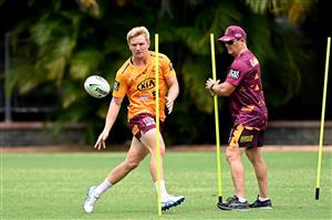 BRISBANE, AUSTRALIA - DECEMBER 01: Tom Dearden runs through a skills drill with Coach Kevin Walters during a Brisbane Broncos NRL training session at the Clive Berghofer Centre on December 01, 2020 in Brisbane, Australia. (Photo by Bradley Kanaris/Getty Images)