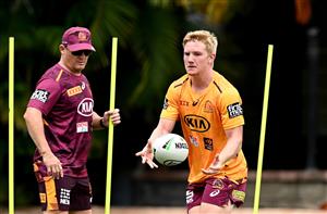 BRISBANE, AUSTRALIA - DECEMBER 01: Tom Dearden runs through a skills drill with Coach Kevin Walters during a Brisbane Broncos NRL training session at the Clive Berghofer Centre on December 01, 2020 in Brisbane, Australia. (Photo by Bradley Kanaris/Getty Images)