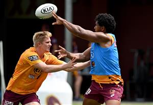 BRISBANE, AUSTRALIA - DECEMBER 01: Tevita Pangai Junior passes the ball during a Brisbane Broncos NRL training session at the Clive Berghofer Centre on December 01, 2020 in Brisbane, Australia. (Photo by Bradley Kanaris/Getty Images)