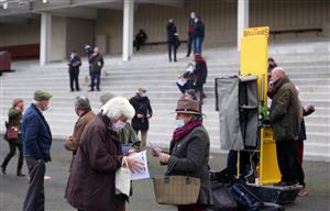 LUDLOW, ENGLAND - DECEMBER 02: Racegoers and Bookmakers at Ludlow Racecourse on December 2, 2020 in Ludlow, England. (Photo by David Davies - Pool/Getty Images)
