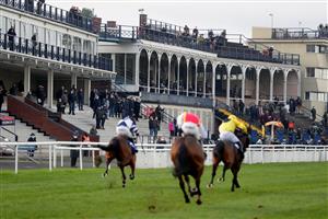 LUDLOW, ENGLAND - DECEMBER 02: Racegoers watch from the grand stand at Ludlow Racecourse on December 2, 2020 in Ludlow, England. (Photo by David Davies - Pool/Getty Images)