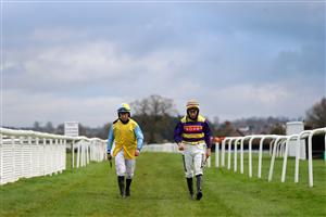 LUDLOW, ENGLAND - DECEMBER 02: Jockey's Lee Edwards (right) and Robert Dunne, both falling from their rides during the Sir Toby Memorial Novices' Handicap Chase on December 2, 2020 in Ludlow, England. (Photo by David Davies - Pool/Getty Images)