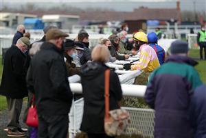 LUDLOW, ENGLAND - DECEMBER 02: Crowds around the parade ring ahead of the opening race at Ludlow Racecourse on December 2, 2020 in Ludlow, England. (Photo by David Davies - Pool/Getty Images)