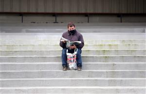 LUDLOW, ENGLAND - DECEMBER 02: A racegoer reads the form in the Racing Post ahead of today's meet at Ludlow Racecourse on December 2, 2020 in Ludlow, England. (Photo by David Davies - Pool/Getty Images)