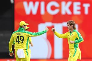 CANBERRA, AUSTRALIA - DECEMBER 02: Adam Zampa of Australia celebrates with Steve Smith after taking the wicket of Shreyas Iyer of India during game three of the One Day International series between Australia and India at Manuka Oval on December 02, 2020 in Canberra, Australia. (Photo by Mark Kolbe/Getty Images)