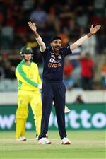 CANBERRA, AUSTRALIA - DECEMBER 02: Jasprit Bumrah of India successfully appeasls for the wicket of Adam Zampa of Australia to claim victory for India during game three of the One Day International series between Australia and India at Manuka Oval on December 02, 2020 in Canberra, Australia. (Photo by Mark Kolbe/Getty Images)
