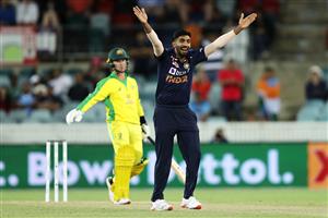 CANBERRA, AUSTRALIA - DECEMBER 02: Jasprit Bumrah of India successfully appeasls for the wicket of Adam Zampa of Australia to claim victory for India during game three of the One Day International series between Australia and India at Manuka Oval on December 02, 2020 in Canberra, Australia. (Photo by Mark Kolbe/Getty Images)