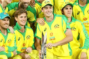 CANBERRA, AUSTRALIA - DECEMBER 02: Cameron Green holds the trophy as the Australian team pose after their series win 2-1 after game three of the One Day International series between Australia and India at Manuka Oval on December 02, 2020 in Canberra, Australia. (Photo by Mark Kolbe/Getty Images)
