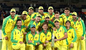 CANBERRA, AUSTRALIA - DECEMBER 02: Australia celebrate with the Series Trophy after game three of the One Day International series between Australia and India at Manuka Oval on December 02, 2020 in Canberra, Australia. (Photo by Ryan Pierse/Getty Images)