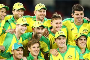 CANBERRA, AUSTRALIA - DECEMBER 02: The Australian team pose with the trophy after their series win 2-1 after game three of the One Day International series between Australia and India at Manuka Oval on December 02, 2020 in Canberra, Australia. (Photo by Mark Kolbe/Getty Images)