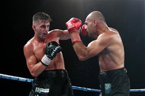 BRISBANE, AUSTRALIA - DECEMBER 03: Issac Hardman punches Tej Pratap Singh during their Middleweight fight at Fortitude Music Hall on December 03, 2020 in Brisbane, Australia. (Photo by Chris Hyde/Getty Images)