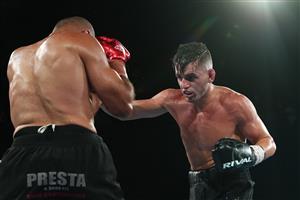BRISBANE, AUSTRALIA - DECEMBER 03: Issac Hardman punches Tej Pratap Singh during their Middleweight fight at Fortitude Music Hall on December 03, 2020 in Brisbane, Australia. (Photo by Chris Hyde/Getty Images)