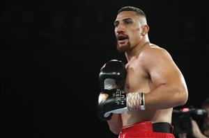 BRISBANE, AUSTRALIA - DECEMBER 03: Justis Huni during his fight against Arsene Fosso in the Australian Heavyweight Title fight at Fortitude Music Hall on December 03, 2020 in Brisbane, Australia. (Photo by Chris Hyde/Getty Images)