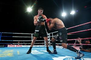 BRISBANE, AUSTRALIA - DECEMBER 03: Issac Hardman punches Tej Pratap Singh during their Middleweight fight at Fortitude Music Hall on December 03, 2020 in Brisbane, Australia. (Photo by Chris Hyde/Getty Images)
