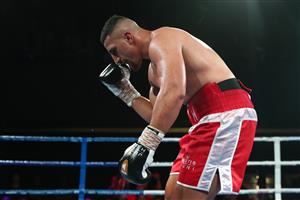BRISBANE, AUSTRALIA - DECEMBER 03: Justis Huni celebrates winning aginst Arsene Fosso during the Australian Heavyweight Title fight at Fortitude Music Hall on December 03, 2020 in Brisbane, Australia. (Photo by Chris Hyde/Getty Images)