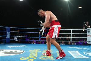 BRISBANE, AUSTRALIA - DECEMBER 03: Justis Huni celebrates winning aginst Arsene Fosso during the Australian Heavyweight Title fight at Fortitude Music Hall on December 03, 2020 in Brisbane, Australia. (Photo by Chris Hyde/Getty Images)