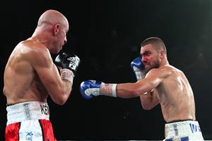 BRISBANE, AUSTRALIA - DECEMBER 03: Ben Kite punches Danny Kennedy during their Welterweight fight at Fortitude Music Hall on December 03, 2020 in Brisbane, Australia. (Photo by Chris Hyde/Getty Images)