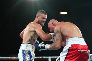 BRISBANE, AUSTRALIA - DECEMBER 03: Ben Kite punches Danny Kennedy during their Welterweight fight at Fortitude Music Hall on December 03, 2020 in Brisbane, Australia. (Photo by Chris Hyde/Getty Images)
