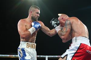 BRISBANE, AUSTRALIA - DECEMBER 03: Ben Kite punches Danny Kennedy during their Welterweight fight at Fortitude Music Hall on December 03, 2020 in Brisbane, Australia. (Photo by Chris Hyde/Getty Images)
