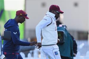 HAMILTON, NEW ZEALAND - DECEMBER 03: Darren Bravo of the West Indies receives medical help during day one of the First Test match in the series between New Zealand and the West Indies at Seddon Park on December 03, 2020 in Hamilton, New Zealand. (Photo by Kai Schwoerer/Getty Images)