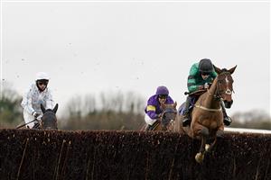 WINCANTON, ENGLAND - DECEMBER 03: Charlie Case riding Kilbrew Boy (green) clear the last to win The Visit racingtv.com Amateur Jockeys' Handicap Chase at Wincanton Racecourse on December 03, 2020 in Wincanton, England. Owners and a limited number of the public are allowed to attend the meeting due to the Coronavirus pandemic. (Photo by Alan Crowhurst/Getty Images)