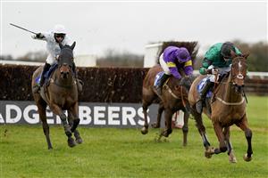 WINCANTON, ENGLAND - DECEMBER 03: Charlie Case riding Kilbrew Boy (green) clear the last to win The Visit racingtv.com Amateur Jockeys' Handicap Chase at Wincanton Racecourse on December 03, 2020 in Wincanton, England. Owners and a limited number of the public are allowed to attend the meeting due to the Coronavirus pandemic. (Photo by Alan Crowhurst/Getty Images)
