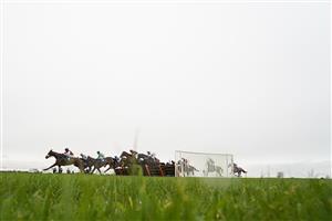 WINCANTON, ENGLAND - DECEMBER 03: A general view as runners clear a flight of hurdles during The Racing TV Profits Returned To Racing 'National Hunt' Novices' Handicap Hurdle at Wincanton Racecourse on December 03, 2020 in Wincanton, England. Owners and a limited number of the public are allowed to attend the meeting due to the Coronavirus pandemic. (Photo by Alan Crowhurst/Getty Images)