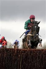 WINCANTON, ENGLAND - DECEMBER 03: Bryan Carver riding Ede'iffs Elton clear the last to win The Weatherbys Racing Bank Foreign Exchange Handicap Chase at Wincanton Racecourse on December 03, 2020 in Wincanton, England. Owners and a limited number of the public are allowed to attend the meeting due to the Coronavirus pandemic. (Photo by Alan Crowhurst/Getty Images)
