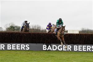 WINCANTON, ENGLAND - DECEMBER 03: Charlie Case riding Kilbrew Boy (green) clear the last to win The Visit racingtv.com Amateur Jockeys' Handicap Chase at Wincanton Racecourse on December 03, 2020 in Wincanton, England. Owners and a limited number of the public are allowed to attend the meeting due to the Coronavirus pandemic. (Photo by Alan Crowhurst/Getty Images)