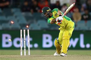CANBERRA, AUSTRALIA - DECEMBER 02: Glenn Maxwell of Australia is bowled by Jasprit Bumrah of Indiaduring game three of the One Day International series between Australia and India at Manuka Oval on December 02, 2020 in Canberra, Australia. (Photo by Ryan Pierse/Getty Images)