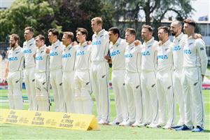 HAMILTON, NEW ZEALAND - DECEMBER 03: Captain Kane Williamson of New Zealand (L) and his team mates line up for their national anthem during day one of the First Test match in the series between New Zealand and the West Indies at Seddon Park on December 03, 2020 in Hamilton, New Zealand. (Photo by Kai Schwoerer/Getty Images)