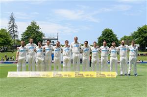 HAMILTON, NEW ZEALAND - DECEMBER 03: Captain Kane Williamson of New Zealand (L) and his team mates line up for their national anthem during day one of the First Test match in the series between New Zealand and the West Indies at Seddon Park on December 03, 2020 in Hamilton, New Zealand. (Photo by Kai Schwoerer/Getty Images)