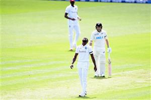 HAMILTON, NEW ZEALAND - DECEMBER 03: Kemar Roach of the West Indies reacts during day one of the First Test match in the series between New Zealand and the West Indies at Seddon Park on December 03, 2020 in Hamilton, New Zealand. (Photo by Kai Schwoerer/Getty Images)