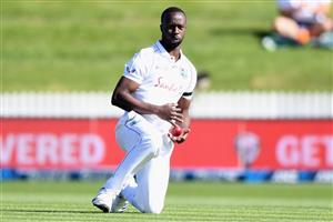 HAMILTON, NEW ZEALAND - DECEMBER 03: Kemar Roach of the West Indies fields the ball during day one of the First Test match in the series between New Zealand and the West Indies at Seddon Park on December 03, 2020 in Hamilton, New Zealand. (Photo by Kai Schwoerer/Getty Images)