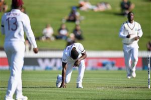 HAMILTON, NEW ZEALAND - DECEMBER 03: Kemar Roach of the West Indies celebrates after dismissing Tom Latham of New Zealand during day one of the First Test match in the series between New Zealand and the West Indies at Seddon Park on December 03, 2020 in Hamilton, New Zealand. (Photo by Kai Schwoerer/Getty Images)