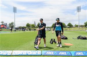 HAMILTON, NEW ZEALAND - DECEMBER 03: Batting Coach Luke Ronchi and Mitchell Santner of New Zealand (L-R) look on prior to day one of the First Test match in the series between New Zealand and the West Indies at Seddon Park on December 03, 2020 in Hamilton, New Zealand. (Photo by Kai Schwoerer/Getty Images)