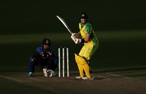 CANBERRA, AUSTRALIA - DECEMBER 02: Steve Smith of Australia bats as KL Rahul of India keeps wicket during game three of the One Day International series between Australia and India at Manuka Oval on December 02, 2020 in Canberra, Australia. (Photo by Ryan Pierse/Getty Images)