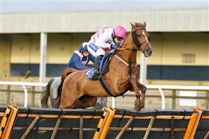 WINCANTON, ENGLAND - DECEMBER 03: Tom Scudamore riding River Bray clear the last to win The Use The racingtv.com Tracker Handicap Hurdle at Wincanton Racecourse on December 03, 2020 in Wincanton, England. Owners and a limited number of the public are allowed to attend the meeting due to the Coronavirus pandemic. (Photo by Alan Crowhurst/Getty Images)
