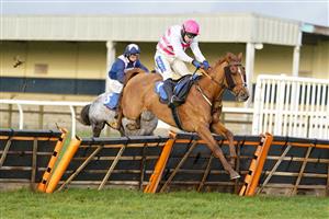 WINCANTON, ENGLAND - DECEMBER 03: Tom Scudamore riding River Bray clear the last to win The Use The racingtv.com Tracker Handicap Hurdle at Wincanton Racecourse on December 03, 2020 in Wincanton, England. Owners and a limited number of the public are allowed to attend the meeting due to the Coronavirus pandemic. (Photo by Alan Crowhurst/Getty Images)