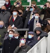 ESHER, ENGLAND - DECEMBER 04: A general view as the crowd wear their face coverings at Sandown Park on December 04, 2020 in Esher, England. Owners and a limited number of the public are allowed to attend the meeting due to the Coronavirus pandemic. (Photo by Alan Crowhurst/Getty Images)