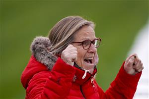 ESHER, ENGLAND - DECEMBER 04: Trainer Susan Gardner cheers home her runner as it wins The Listen To Weighed-In Podcast On Betfair Mares' Handicap Hurdle at Sandown Park on December 04, 2020 in Esher, England. Owners and a limited number of the public are allowed to attend the meeting due to the Coronavirus pandemic. (Photo by Alan Crowhurst/Getty Images)