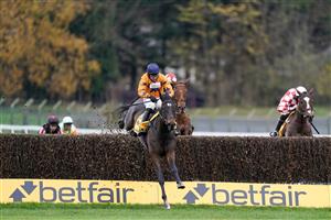 ESHER, ENGLAND - DECEMBER 04: Harry Skelton riding Alnadam (orange) clear the last to win The My Oddsboost On Betfair Novices' Limited Handicap Chase at Sandown Park on December 04, 2020 in Esher, England. Owners and a limited number of the public are allowed to attend the meeting due to the Coronavirus pandemic. (Photo by Alan Crowhurst/Getty Images)