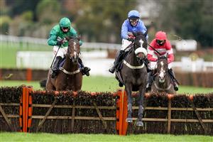 ESHER, ENGLAND - DECEMBER 04: Nico de Boinville riding Star Gate (blue) clear the last to win The Ballymore Winter Novices' Hurdle at Sandown Park on December 04, 2020 in Esher, England. Owners and a limited number of the public are allowed to attend the meeting due to the Coronavirus pandemic. (Photo by Alan Crowhurst/Getty Images)