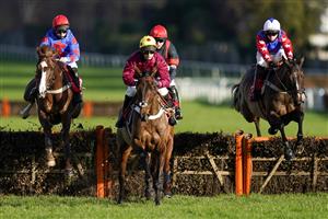 ESHER, ENGLAND - DECEMBER 05: Jamie Moore riding Golden Boy Grey (L, red cap) on their way to winning The My Oddsboost On Betfair 'National Hunt' Novices' Hurdle at Sandown Park on December 05, 2020 in Esher, England. Owners and a limited number of the public are allowed to attend the meeting due to the Coronavirus pandemic. (Photo by Alan Crowhurst/Getty Images)