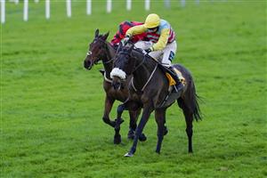 ESHER, ENGLAND - DECEMBER 05: Millie Wonnacott riding Doing Fine (R) clear the last to win The Betfair Exchange Back And Lay London National Handicap Chase at Sandown Park on December 05, 2020 in Esher, England. Owners and a limited number of the public are allowed to attend the meeting due to the Coronavirus pandemic. (Photo by Alan Crowhurst/Getty Images)