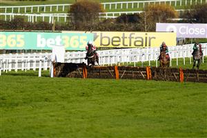 ESHER, ENGLAND - DECEMBER 05: Niall Houlihan riding Fifty Ball clear the last to win The Read Paul Nicholls On betting.betfair Novices' Handicap Hurdle at Sandown Park on December 05, 2020 in Esher, England. Owners and a limited number of the public are allowed to attend the meeting due to the Coronavirus pandemic. (Photo by Alan Crowhurst/Getty Images)