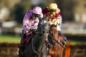 ESHER, ENGLAND - DECEMBER 05: Paddy Brennan riding Elham Valley (pink, pink cap) clear the last to win The Betfair Free Bet On The 1.50 Introductory Juvenile Hurdle at Sandown Park on December 05, 2020 in Esher, England. Owners and a limited number of the public are allowed to attend the meeting due to the Coronavirus pandemic. (Photo by Alan Crowhurst/Getty Images)